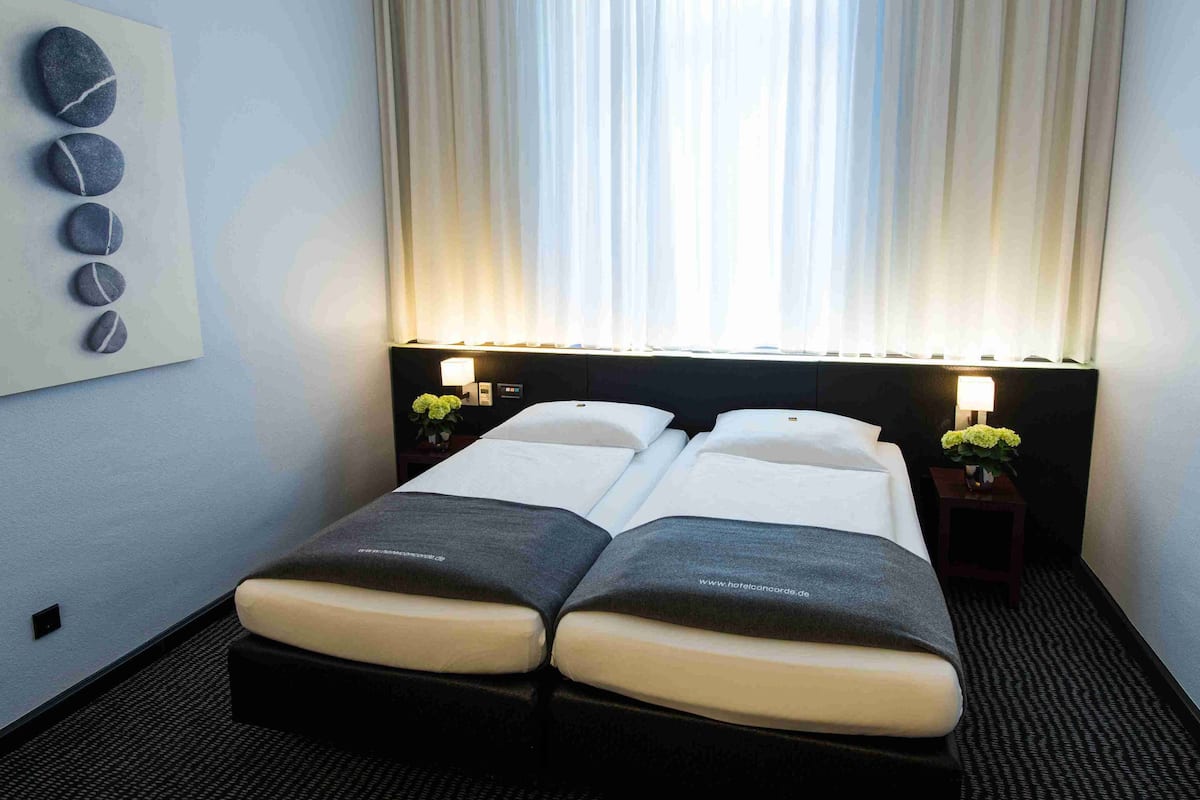 Chambre Standard double ou avec lits jumeaux | Literie de qualité, minibar, bureau