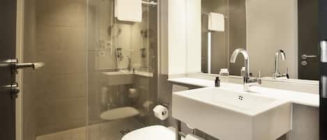 Shower, free toiletries, hair dryer, towels