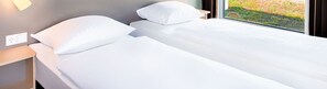 Twin Room | Hypo-allergenic bedding, minibar, desk, soundproofing