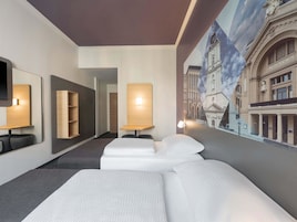 Ropa de cama hipoalergénica, escritorio y sistema de insonorización