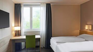 Literie de qualité supérieure, coffres-forts dans les chambres, bureau