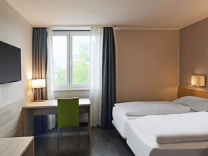 Premium bedding, in-room safe, desk, blackout drapes