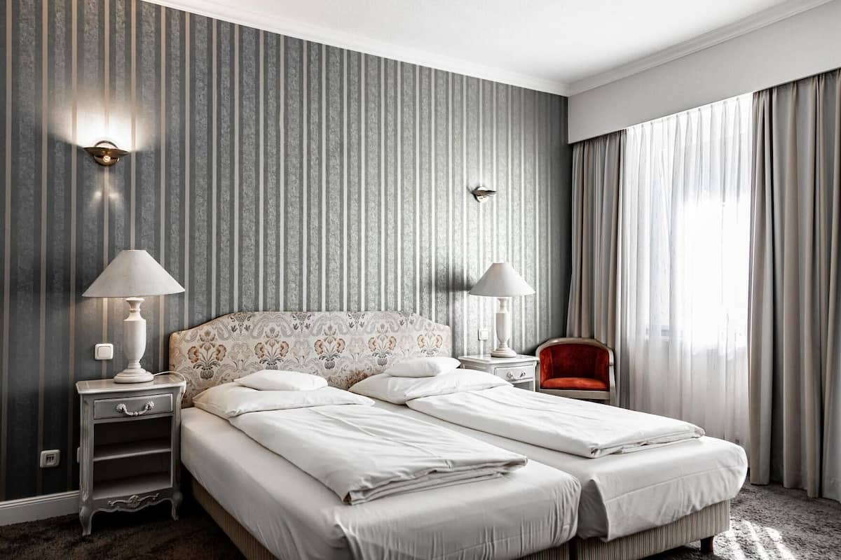 Hypo-allergenic bedding available, minibar, in-room safe, desk
