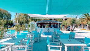 Sun loungers, beach umbrellas, beach towels