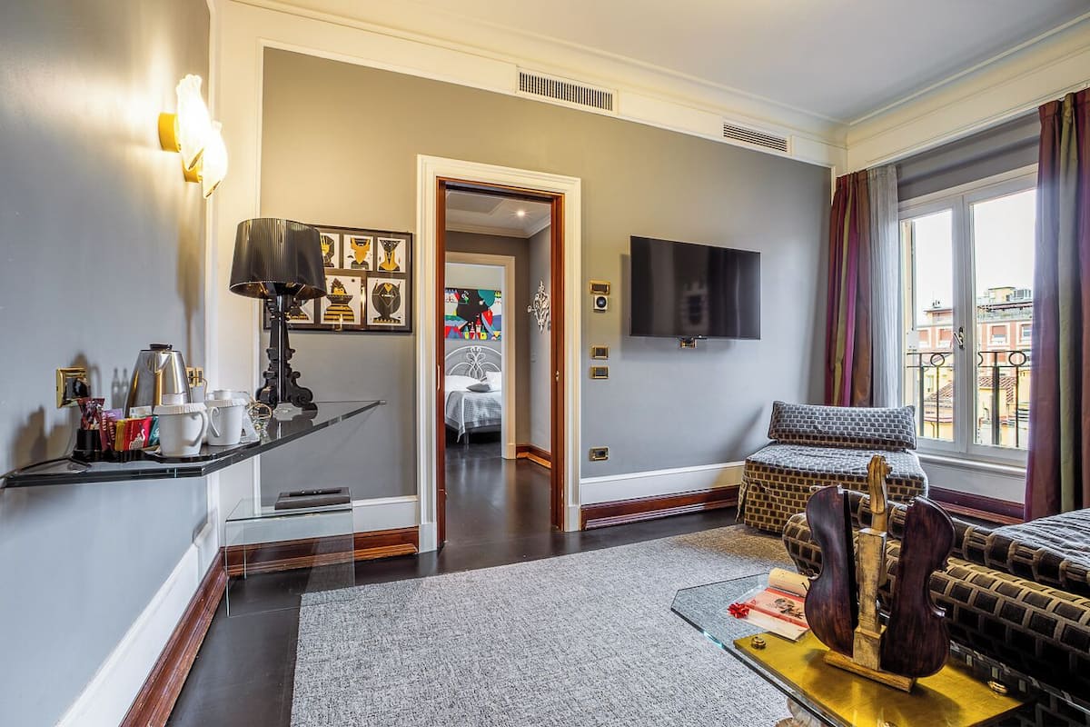 Deluxe Suite (Ai Colli) | Hypo-allergenic bedding, in-room safe, blackout drapes, soundproofing