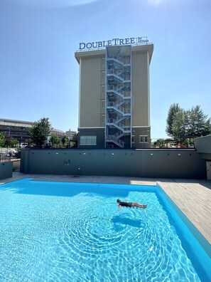 Seasonal outdoor pool, pool umbrellas, sun loungers