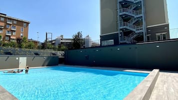 Seasonal outdoor pool, pool umbrellas, sun loungers