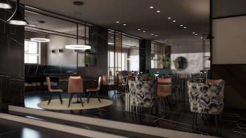 A modern restaurant with a bar area, seating with floral upholstery, and pendant lighting.