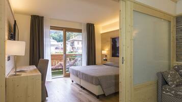 Kamar Quadruple Junior | 1 kamar tidur, selimut bulu angsa, minibar, dan brankas