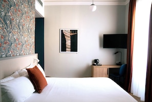 Double Room | Minibar, desk, blackout drapes, iron/ironing board