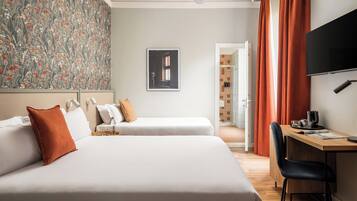 Triple Room | Minibar, desk, blackout drapes, iron/ironing board
