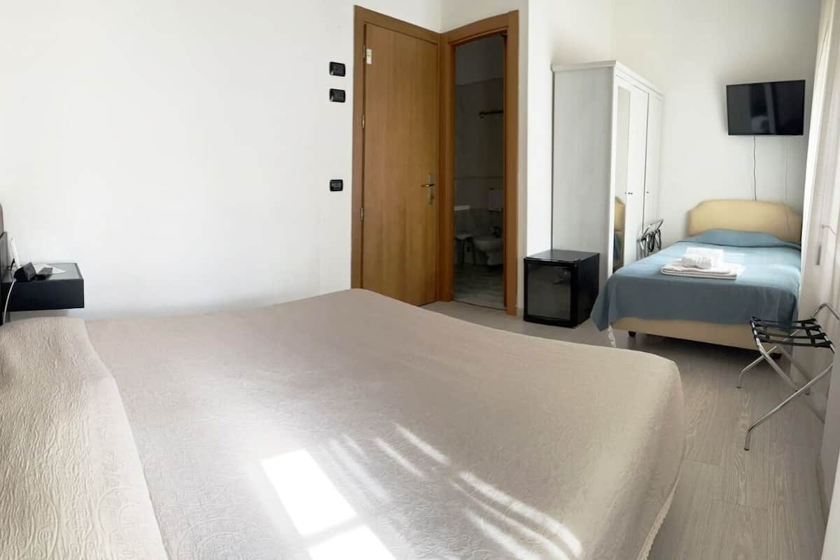 Premium bedding, down duvets, in-room safe, desk