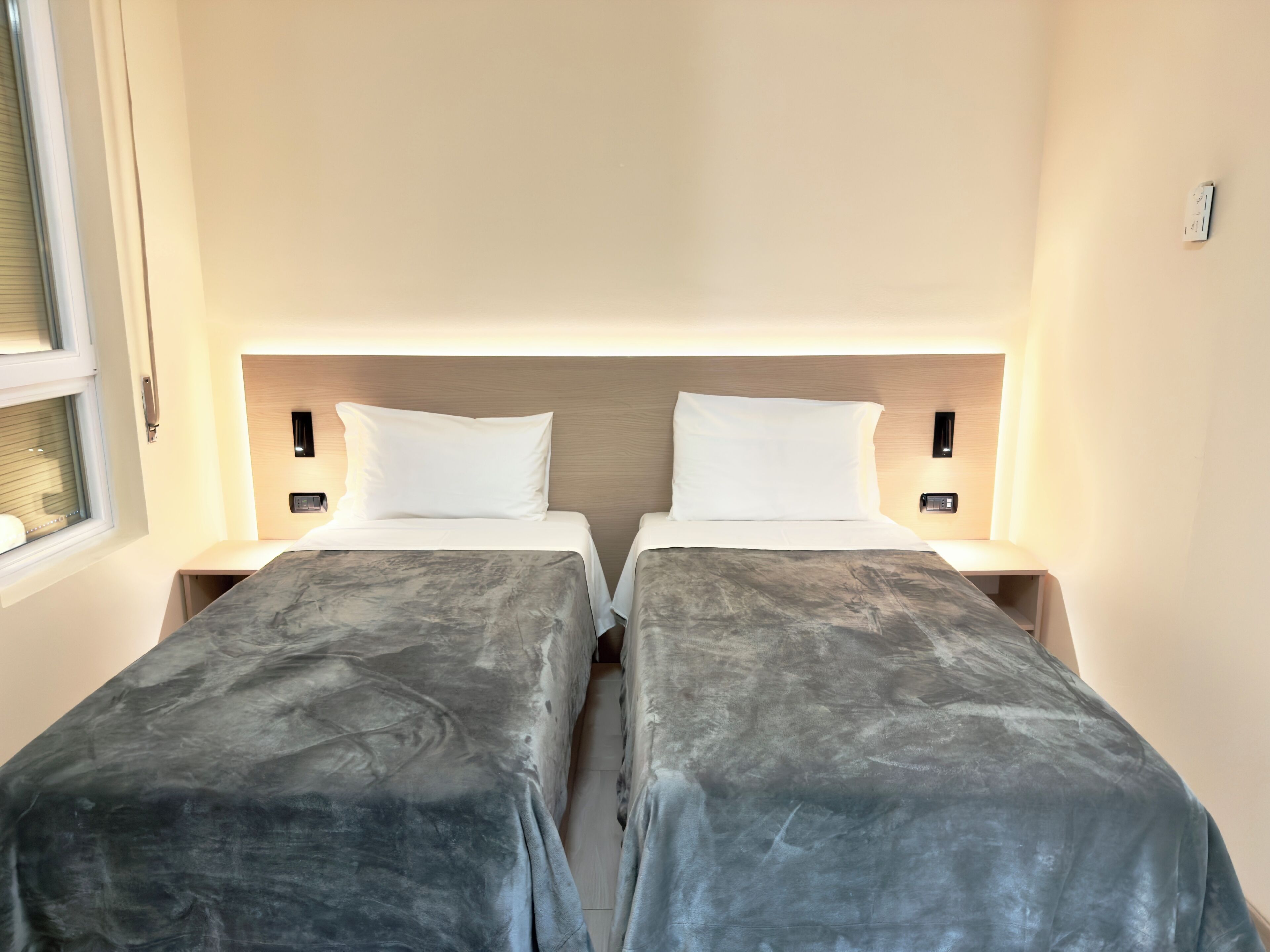 Premium bedding, down duvets, in-room safe, desk