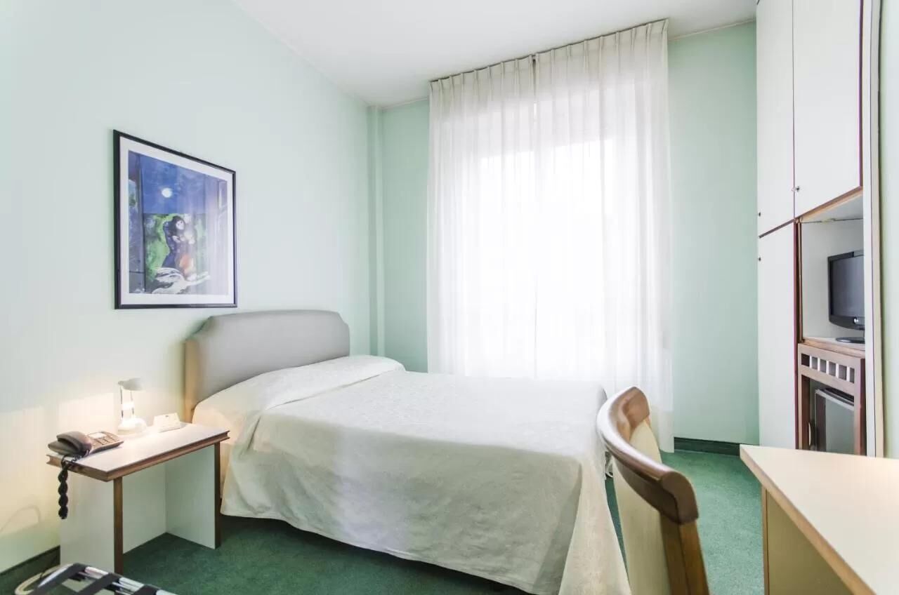 Premium bedding, down duvets, in-room safe, desk
