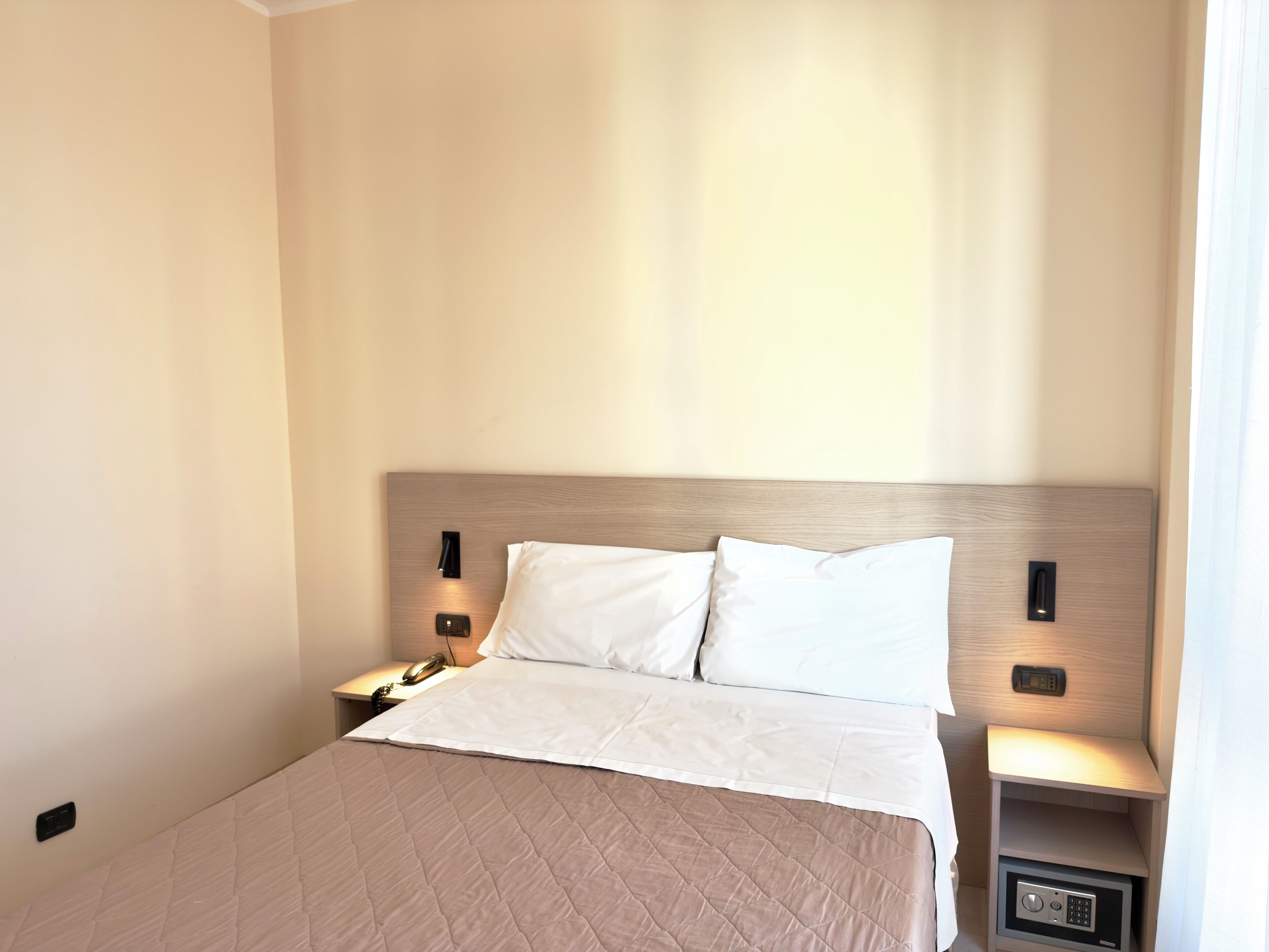 Premium bedding, down duvets, in-room safe, desk