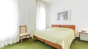 Premium bedding, down duvets, in-room safe, desk