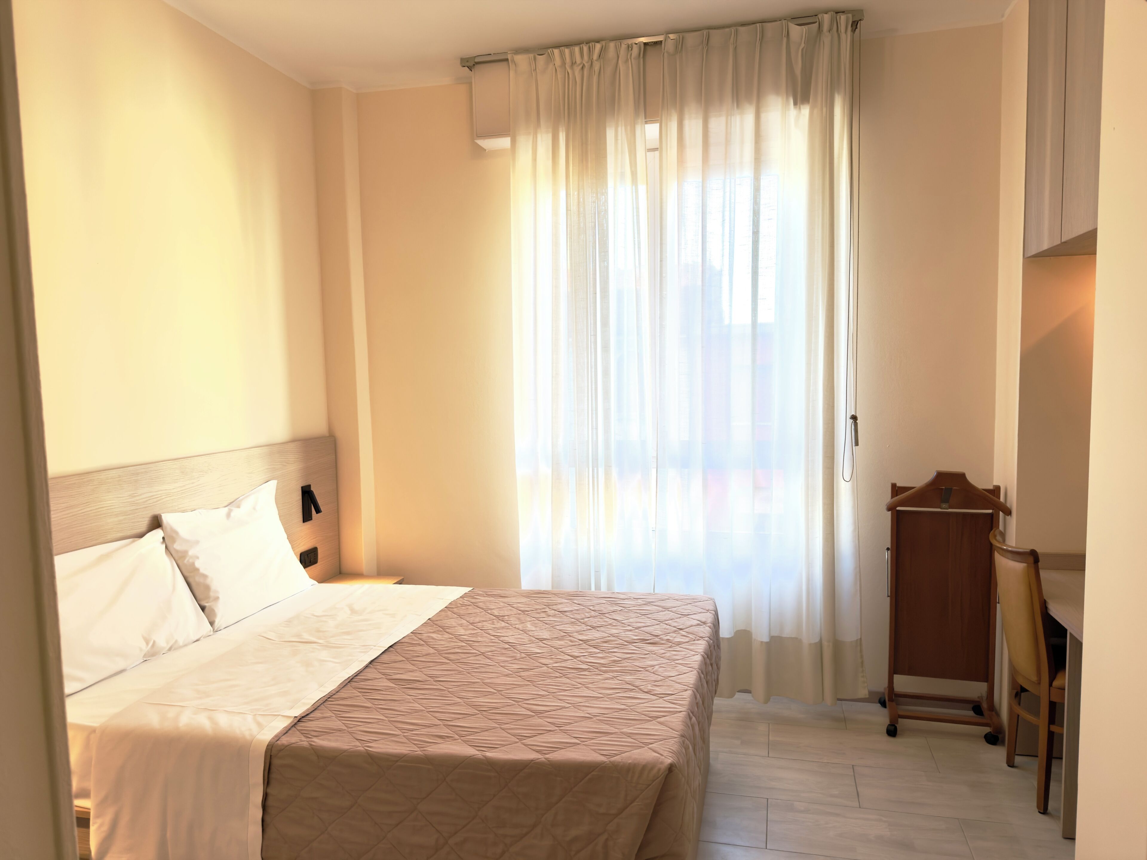 Premium bedding, down duvets, in-room safe, desk