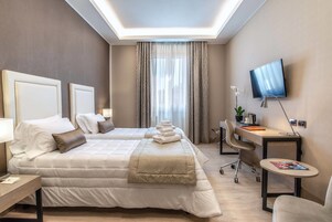 Ropa de cama de alta calidad y minibar 