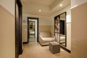 Junior Suite, 1 King Bed | Premium bedding, minibar, in-room safe, desk