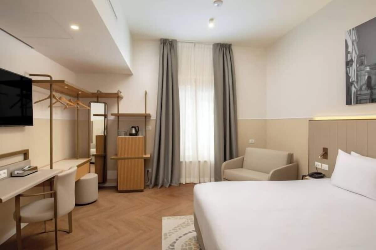 1 habitación, ropa de cama de alta calidad y minibar