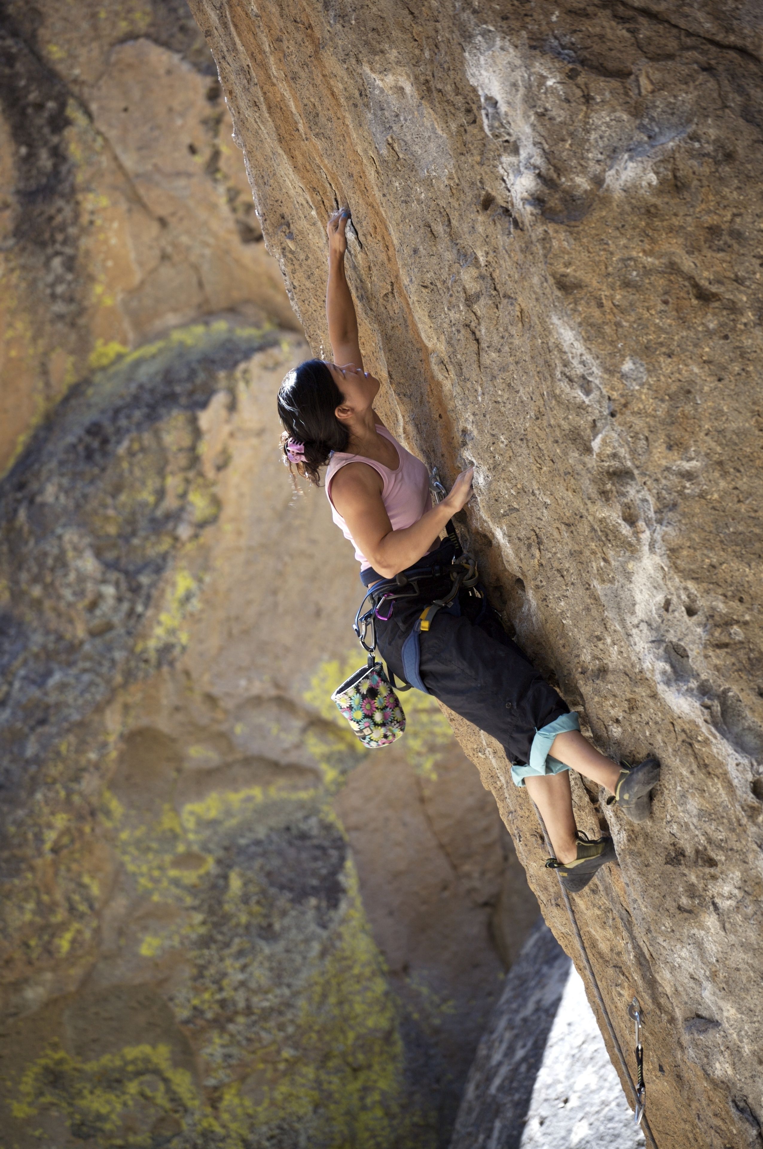 A person climbing a rock face.