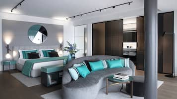 Un dormitorio moderno con un sofá gris curvo, una cama grande con ropa de cama verde azulado y negra, y una mesita de noche con un jarrón.