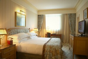 Memory-foam beds, minibar, in-room safe, desk