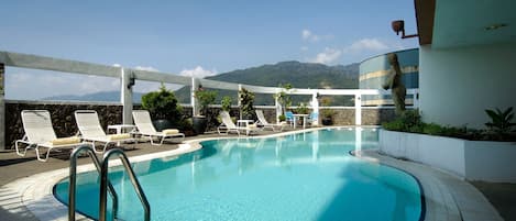 Outdoor pool, pool loungers