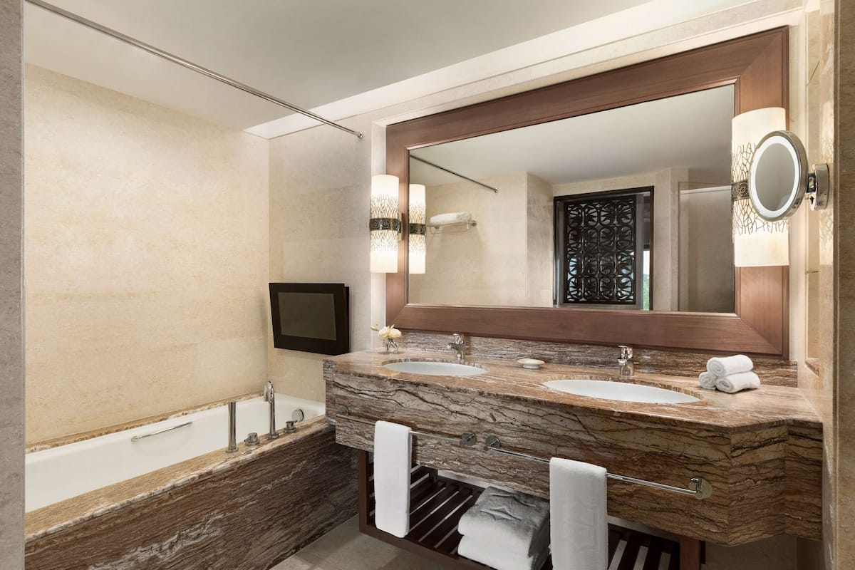 garden executive suite (king) | bathroom | hair dryer, bathrobes, slippers, bidet