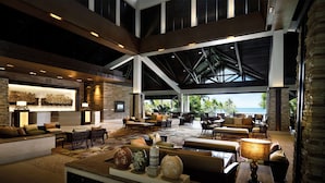 A spacious lobby with high ceilings, a view of the ocean, and a variety of seating arrangements. - Shangri-La Rasa Ria, Kota Kinabalu (Tuaran)