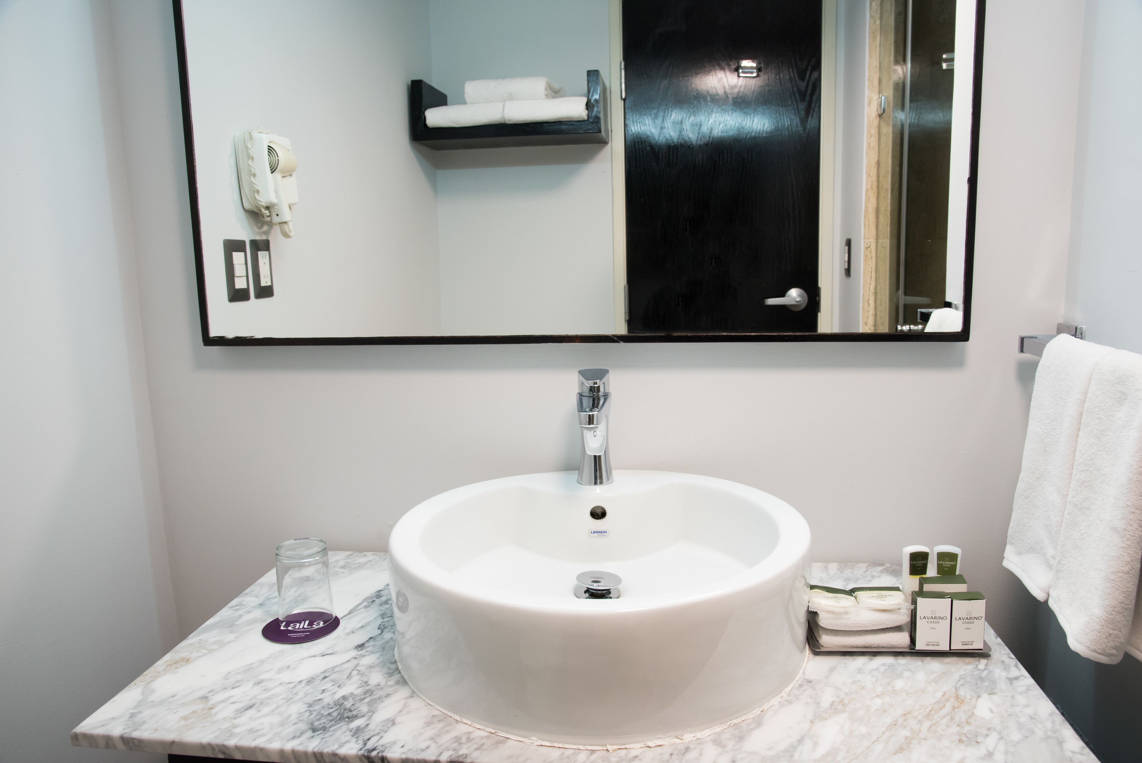 shower, designer toiletries, hair dryer, towels