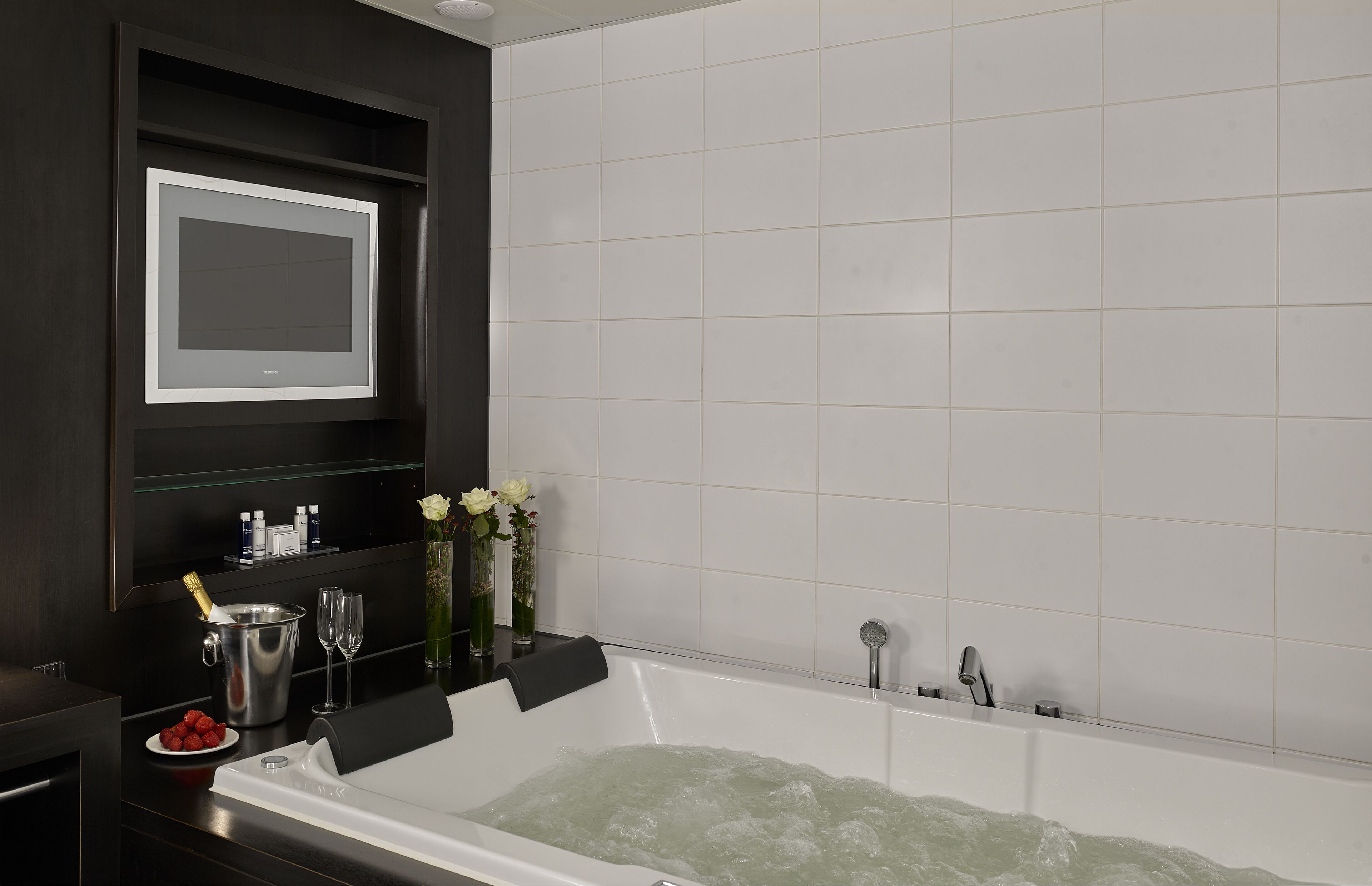Bathroom | Designer toiletries, hair dryer, towels