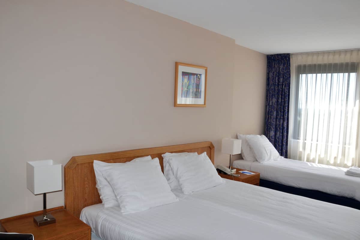 Desk, blackout drapes, rollaway beds, free WiFi