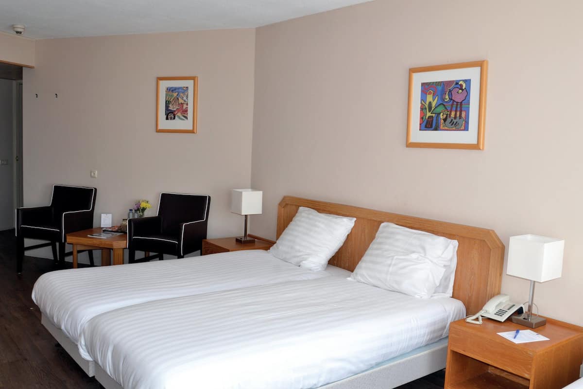 Desk, blackout drapes, rollaway beds, free WiFi