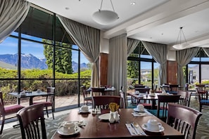Breakfast, dinner served; local cuisine, garden views