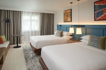 Premium bedding, down comforters, pillowtop beds, in-room safe at Hotel Rumbao, a Tribute Portfolio Hotel