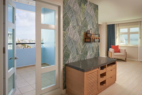 Premium bedding, down comforters, pillowtop beds, in-room safe