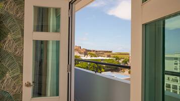 Premium bedding, down comforters, pillowtop beds, in-room safe