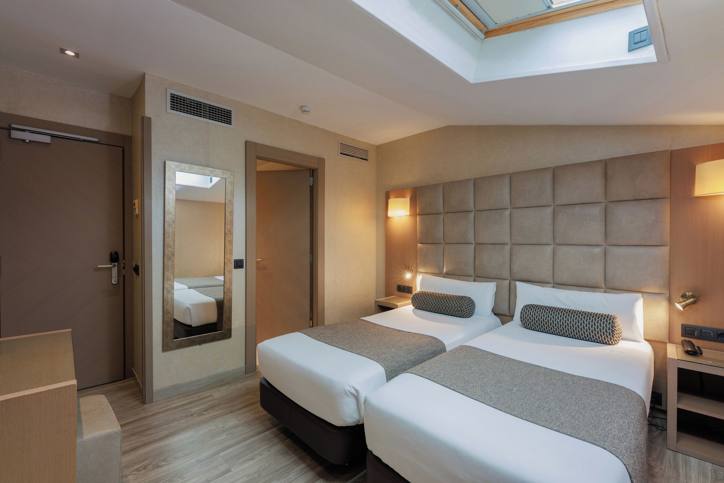 Down comforters, in-room safe, desk, soundproofing