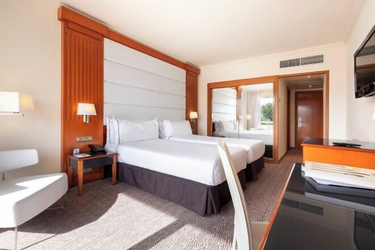 Premium bedding, minibar, in-room safe, blackout drapes