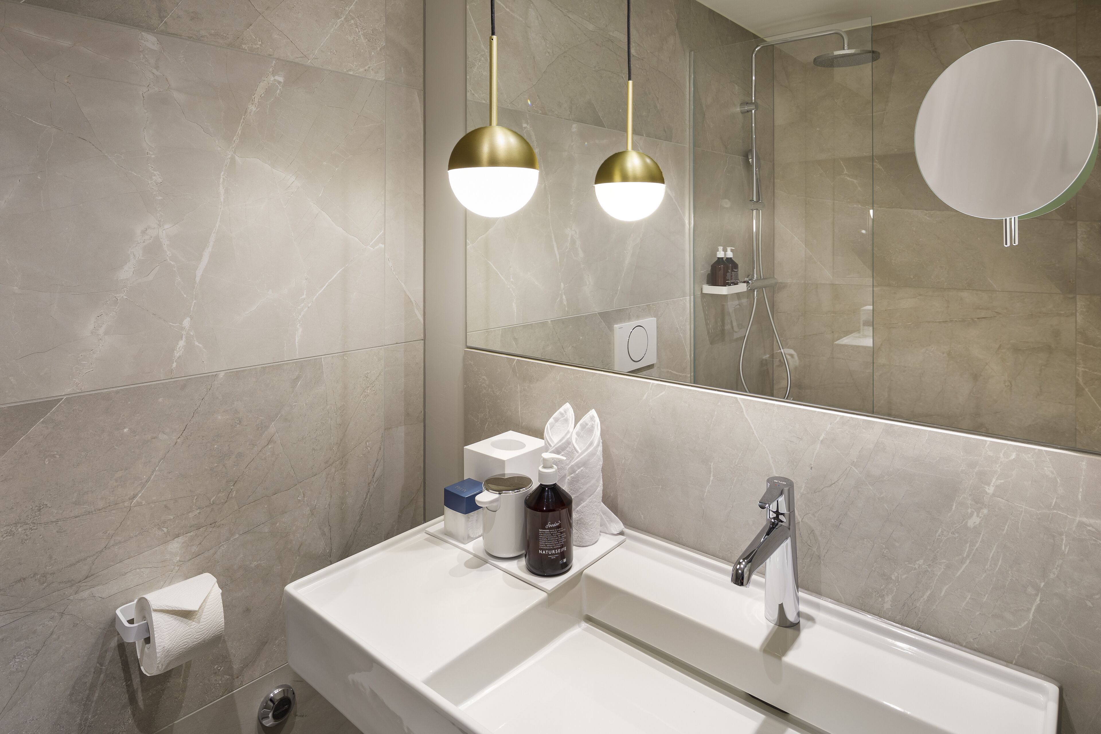 eco-friendly toiletries, hair dryer, towels