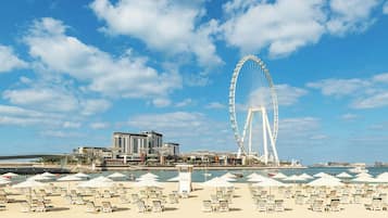 Private beach, white sand, sun-loungers, beach umbrellas