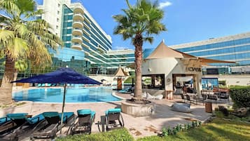 Outdoor pool, pool umbrellas, pool loungers