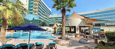 Outdoor pool, pool umbrellas, pool loungers