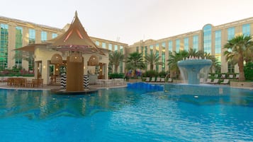 Outdoor pool, pool umbrellas, sun loungers