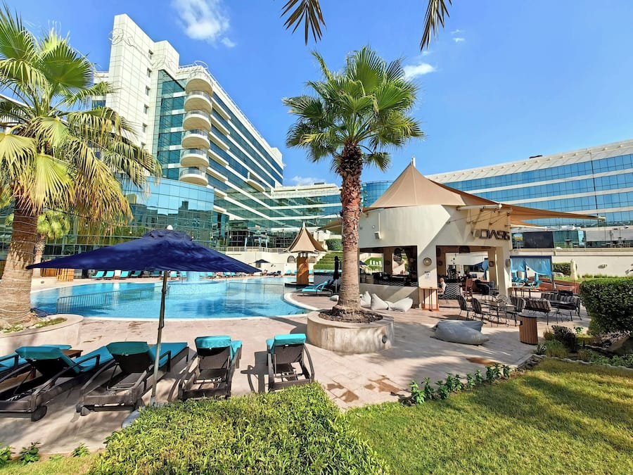 Outdoor pool, pool umbrellas, sun loungers