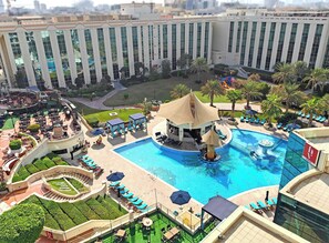 Outdoor pool, pool umbrellas, sun loungers