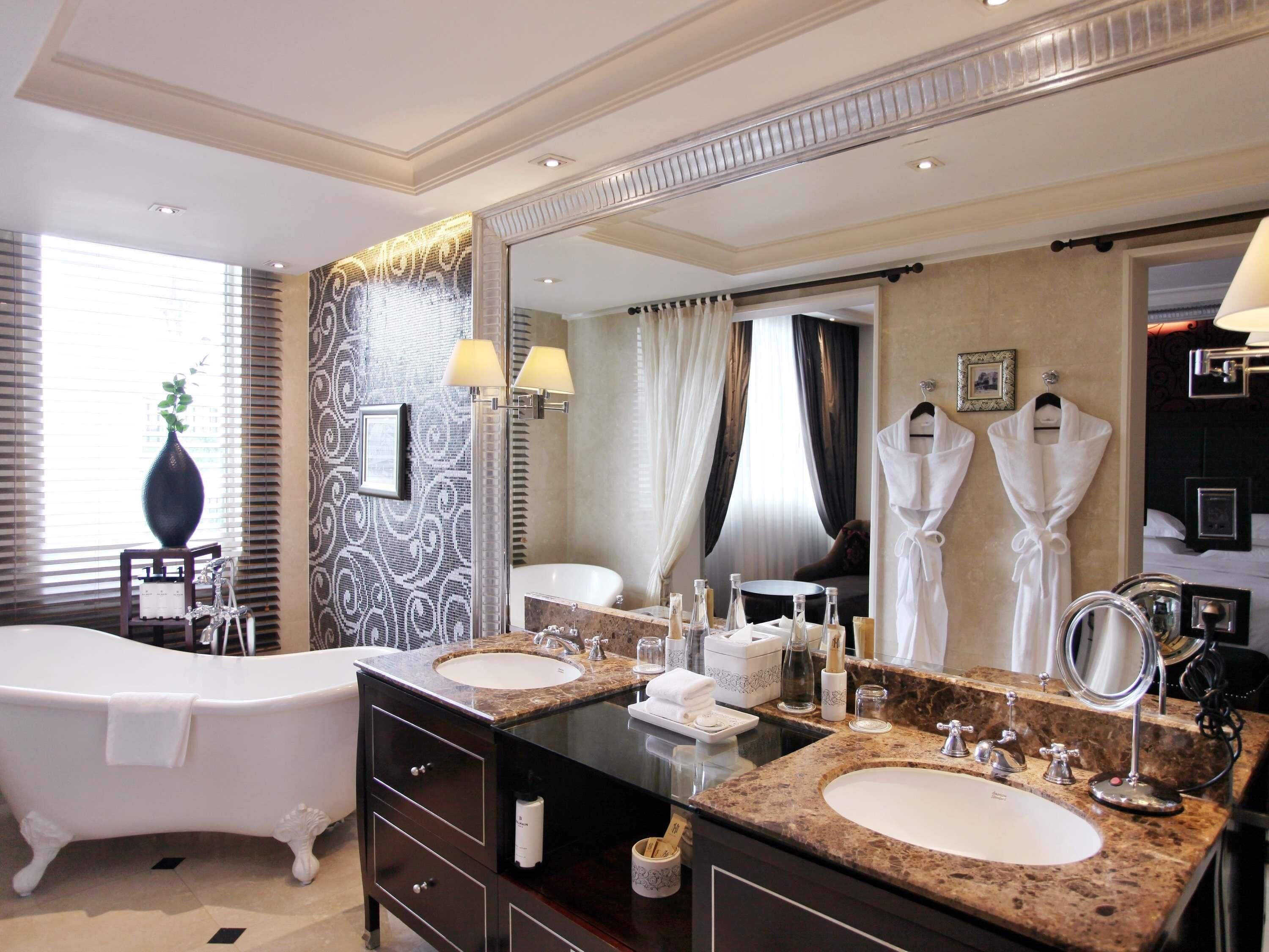 Premium bedding, down comforters, pillowtop beds, minibar