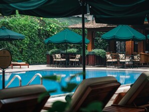 Outdoor pool, open 6:30 AM to 9:00 PM, pool umbrellas, pool loungers