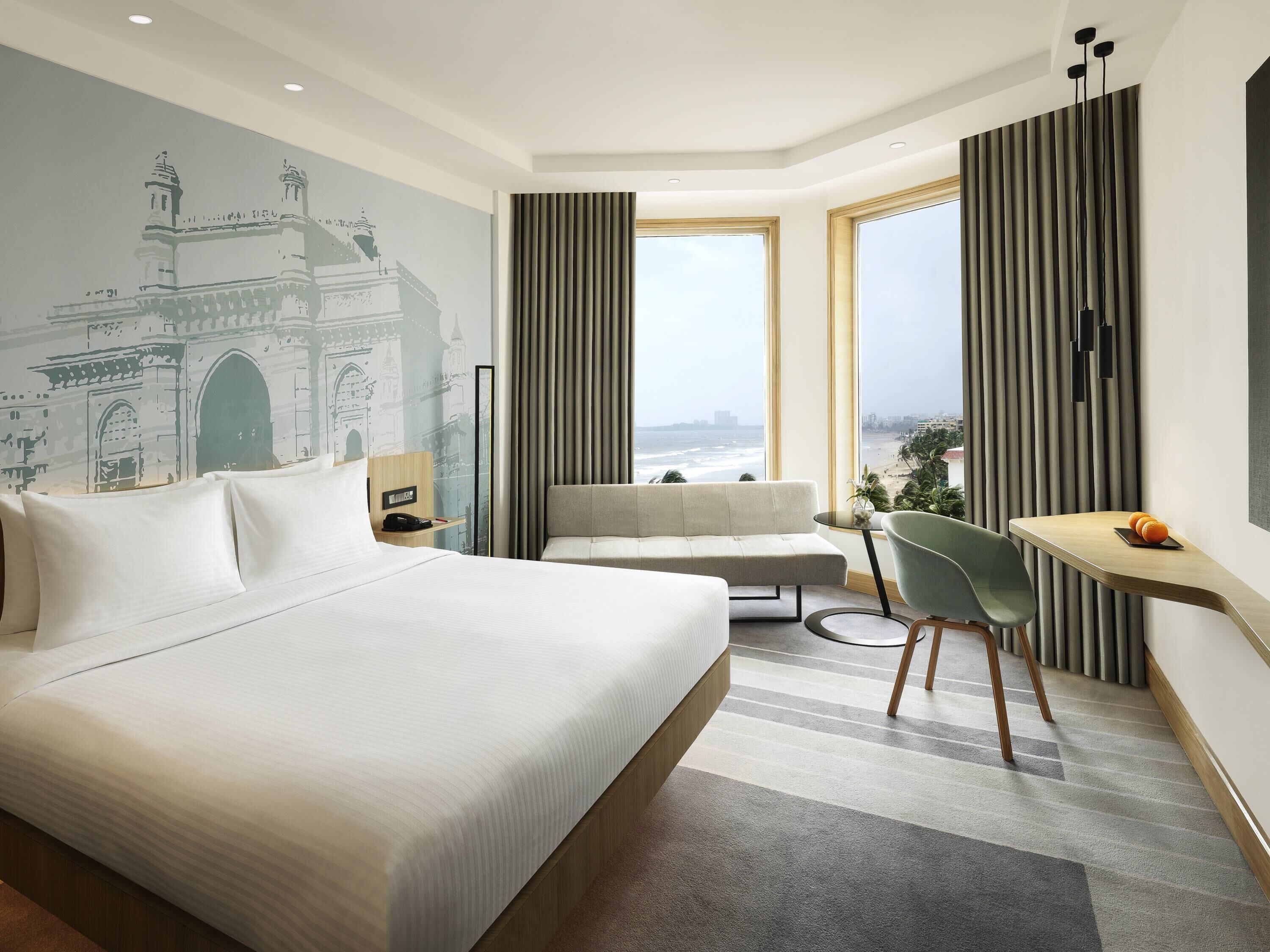 Habitación superior, 1 cama de matrimonio grande, vistas al mar | Ropa de cama de alta calidad, minibar, caja fuerte